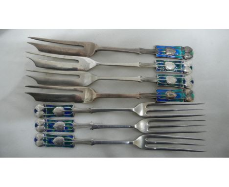 Archibald Knox for Liberty &amp; Co - seven silver and blue green enamel, pastry and fruit forks with Medea pattern to tops, 