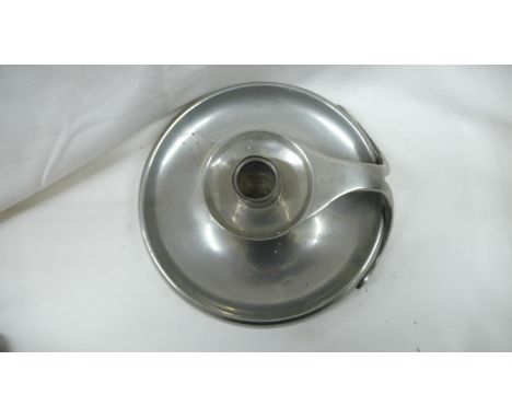 Liberty &amp; Co - Tudric Pewter circular chamber candlestick with split handle having rivet decoration No. 02610, Diam. 19 c