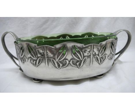 Archibald Knox for Liberty &amp; Co. Tudric Pewter Oval planter with two loop handles, pierced foliate design on four button 