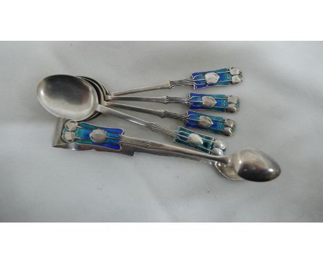 Archibald Knox for Liberty &amp; Co - four silver and blue green enamel tea spoons and sugar tongs, Medea pattern to tops, Bi