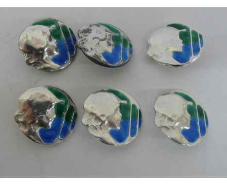 A set of six Art Nouveau silver and blue/green enamel buttons designed by Kate Harris  with decoration of a Puritan Maid Birm