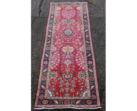A Hamadan runner. 300 x 97 cm.