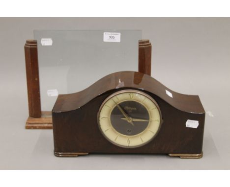 A mantle clock and an Art Deco glass picture frame. The former 31 cm wide.