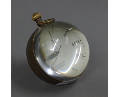 A ball clock. 6 cm high.