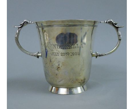 A twin handled silver trophy cup, inscribed Cinderella July 22nd 1905. 14.5 cm high. 16.6 troy ounces. 