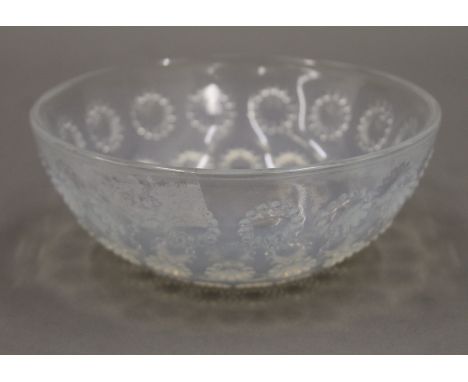 A small R Lalique France glass bowl. 13 cm diameter.