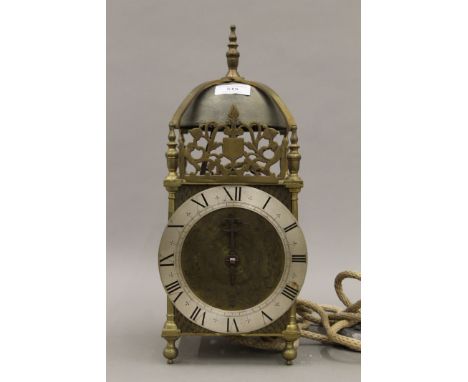 An 18th century style lantern clock. 37 cm high.
