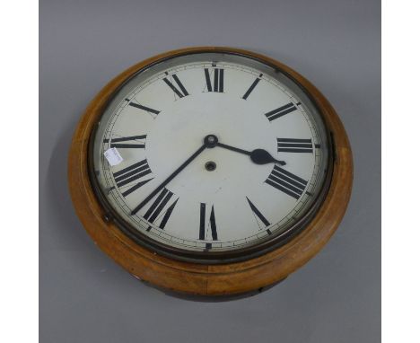 A Victorian dial clock. 38 cm diameter.