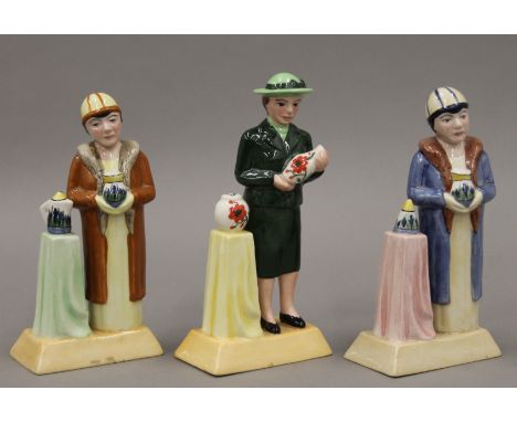 Three Manor Limited Editions The Pottery Ladies, two Clarice Cliff and one Susie Cooper. The latter 15.5 cm high.