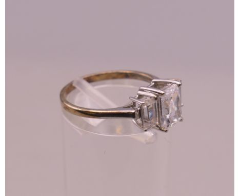 A 9 ct white gold dress ring. Ring size K/L. 2.1 grammes total weight.