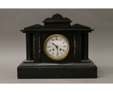 A Victorian marble and black slate mantle clock. 33 cm high.