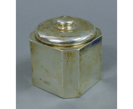 A silver tea caddy. 8.5 cm high. 166.2 grammes.