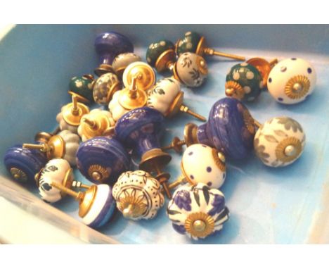 Box of ceramic doorknobs 