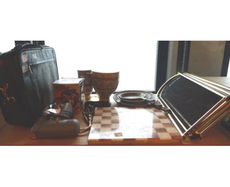 Shelf of mixed items including laptop case, firescreen, staple gun, micrometer, pair of bongos, cast iron pans etc 
