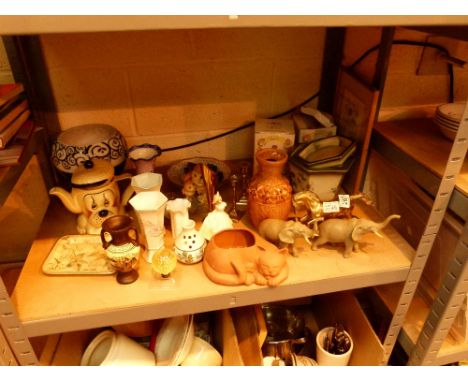 Shelf of mixed items including a brass horse and a dog teapot 