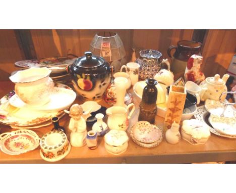 Shelf of mixed ceramics