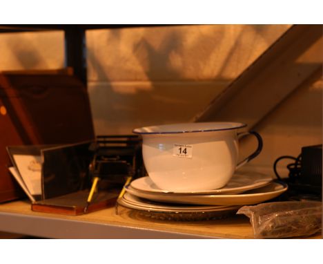 Shelf of assorted items including shoe horn, plates, first day covers, Bible etc