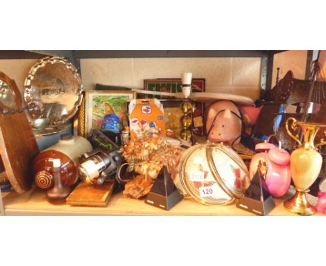 Shelf of mixed items including lamps, pictures, phone, ornaments etc