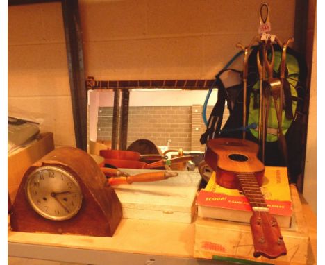 Shelf of mixed items including companion set, mirror, cutlery, game, two cast iron pans, clock etc 