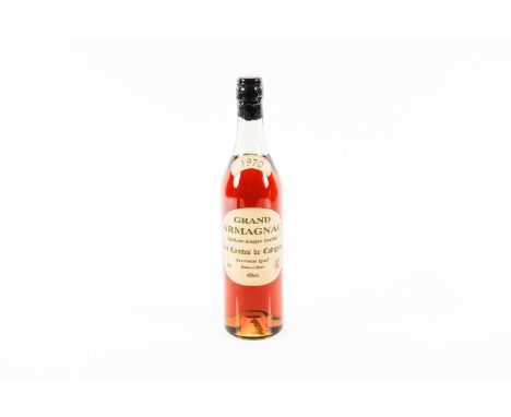 A bottle of 1970 Les Comtes de Cadignan Grand Armagnac, 70cl, 40%, in presentation box.