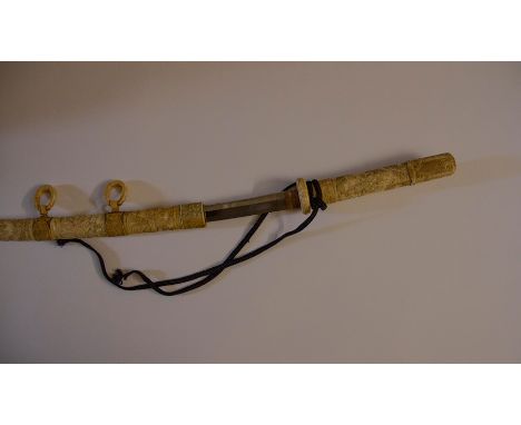 Japanese Wakizashi&nbsp;sword with 54cm long blade. Decorated carved Ivory grip and Tsuba showing hunting scenes. Overall len