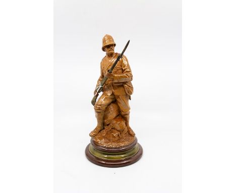 Doulton Lambeth salt-glazed stoneware model of Boer War Soldier, circa 1902, modelled by John Broad, the main light brown sal