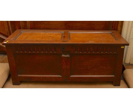 &nbsp;A mid 17th Century oak transitional chest, the&nbsp;boarded construction to sides and frame and panel&nbsp;construction