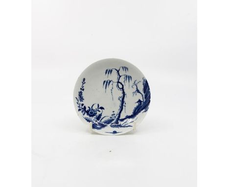 A Worcester saucer, painted in under-glaze blue in 'The Landslip' pattern, circa 1758, 11.7cm diameterProvenance: The Roy Pin