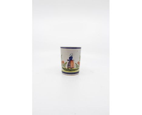A late 19th Century early mark HB Quimper beaker with Bretonne lady figure and floral sprigs.Size 10.5 cm. high, 8.5cm. diame