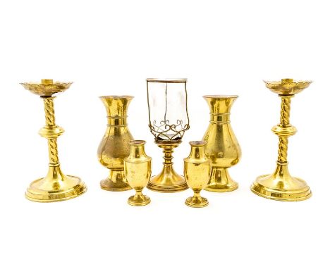 A series of assorted ecclesiastic brass wares, to include hollow wares, a pair of low knop stem candlesticks and a light with