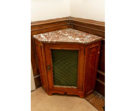 &nbsp;A 19th Century marble topped corner cupboard with metal lattice work door panel