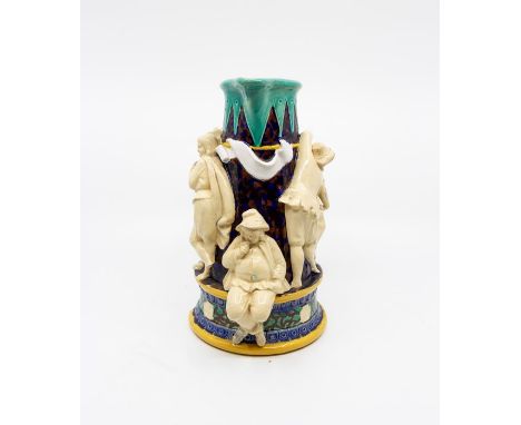A Victorian Majolica jug, possibly Minton, registration mark for 1846, dark blue and brown mottled body, with light green int