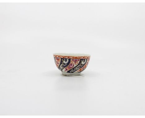 A Worcester polychrome Tea Bowl. Decorated with The Queen Charlotte Pattern. Circa 1780. Blue fret mark. Size 7.5cm. diameter