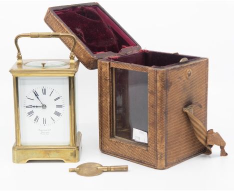 A French repeating brass carriage clock, early 20th&nbsp;century, corniche case, white enamel dial with&nbsp;Roman numerals, 
