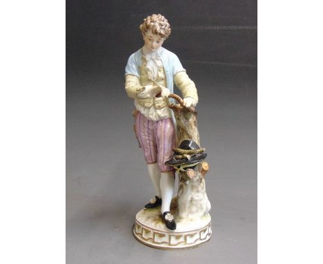 A Meissen figure of a young woodman gathering sticks in his hat, 19th Century, blue crossed swords, impressed 137, incised F6