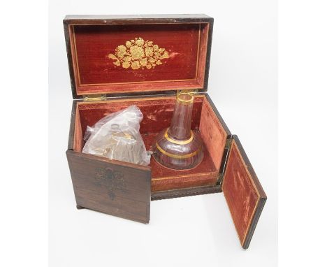 A 19th Century tea caddy with decorative brass inlay to lid and "tea" to centre of design.&nbsp; Opening doors to front to sh