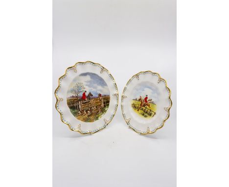 A Royal Crown Derby cabinet plate hand painted with a hunting scene, signed W.A.L.,within a fluted rim, with gilt bands and t