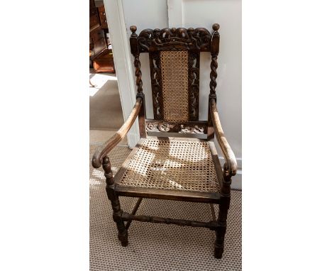 &nbsp;A late Victorian Carolean revival style oak open&nbsp;armchair, the carved crest rail depicting a Crown&nbsp;supported 