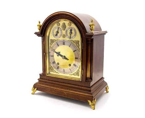 An Edwardian mahogany cased bracket clock, of 18th Century design, arched top, gilt metal finials, the arch with chime/silent