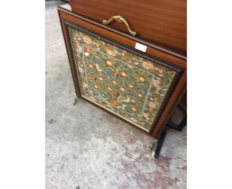 A TAPESTRY FIRE SCREEN 