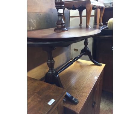 A REPRODUCTION COFFEE TABLE AND TRIPOD TABLE