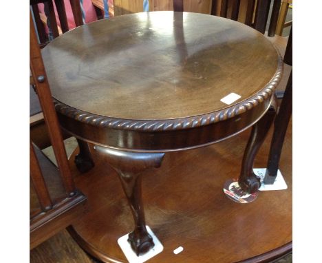 A ROUND OCCASSIONAL TABLE WITH CLAW AND BALL FEET AND GADROONED EDGE H45CM DIAM60CM