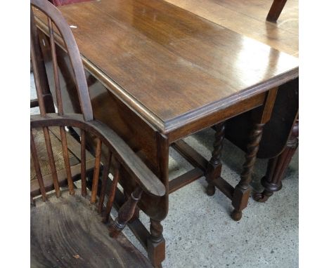 AN OAK DROP LEAF TABLE