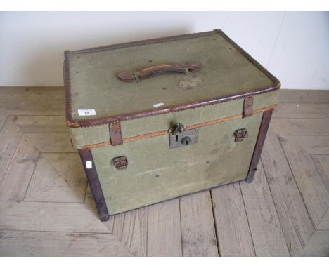 Vintage canvas and leather trimmed travelling trunk with star painted detail to the side and heavy brass lock (39cm x 51cm x 