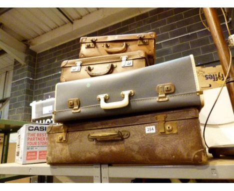 Four vintage suitcases 