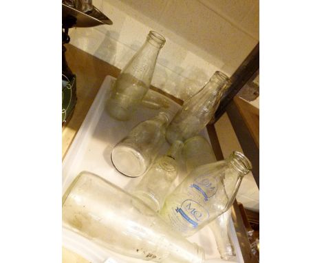 Tray of vintage milk bottles