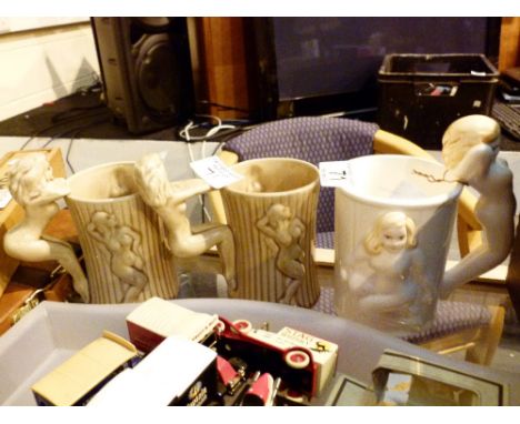 Three risque ceramic drinking mugs 