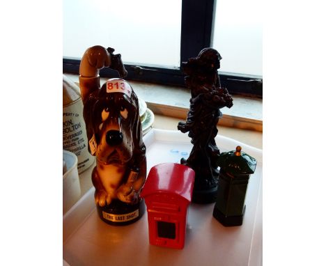 Two Honiton ceramic postboxes and a figurine 