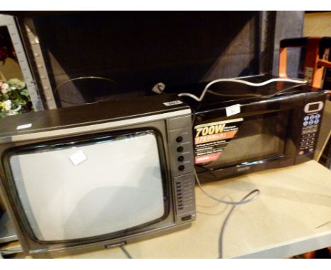Vintage Ferguson television and a 700W Sanyo microwave 