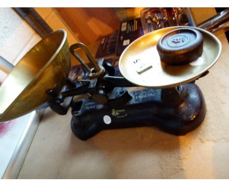 Cast iron and brass scales with weights